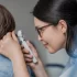 an ontologist checking her patientâ€™s ear condition